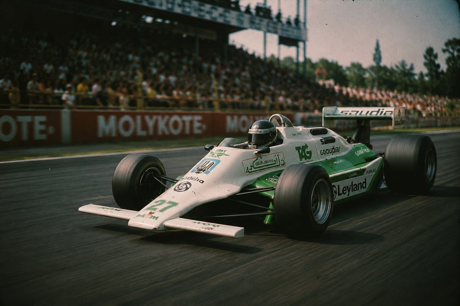 Williams FW07B van Alan Jones in de Saudia-livery in actie tijdens het seizoen 1980